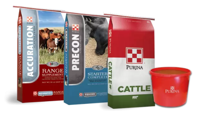 Purina Calf Starter products available at H&S Country Store. Bagged feed and mineral tub.
